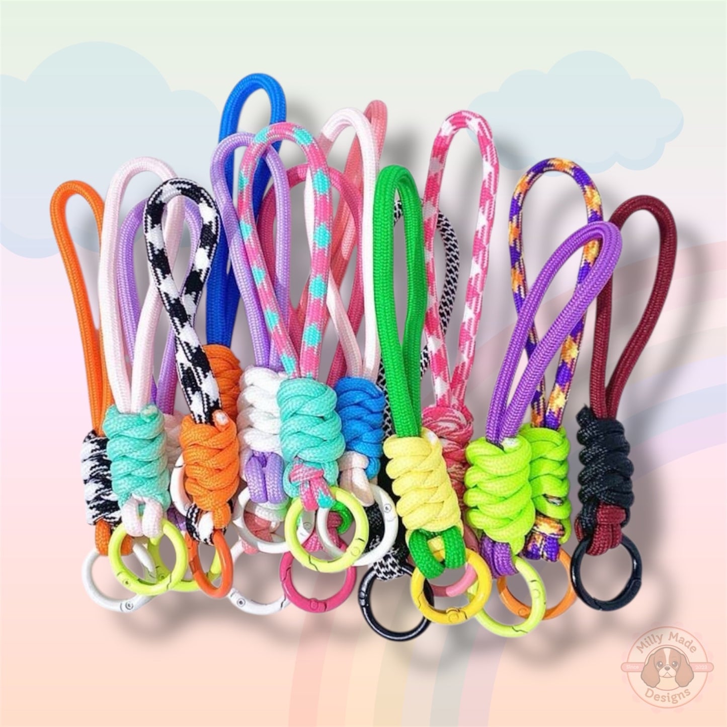 Collection of colorful keychains with various designs on a light background